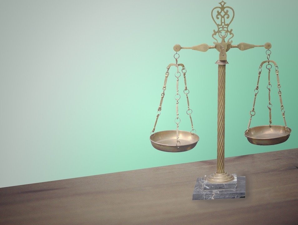 Scales of justice in balance